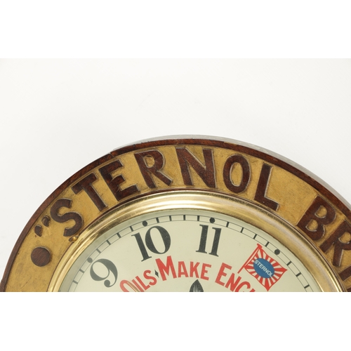 1312 - AN EARLY 20TH CENTURY ADVERTISING STERNOL OILS WALL CLOCK having a carved wooden surround with textu... 