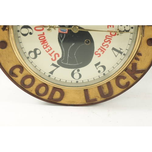 1312 - AN EARLY 20TH CENTURY ADVERTISING STERNOL OILS WALL CLOCK having a carved wooden surround with textu... 