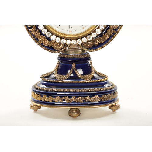 1318 - A LATE 19TH CENTURY FRENCH PORCELAIN AND ORMOLU MOUNTED LYRE-SHAPED MANTEL CLOCK the jewelled swingi... 