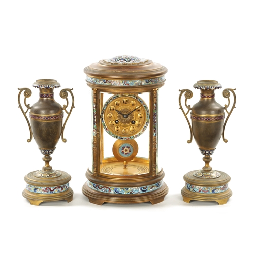 1321 - A LATE 19TH CENTURY FRENCH ORMOLU AND CHAMPLEVE ENAMEL CLOCK GARNITURE the unusual circular four-gla... 