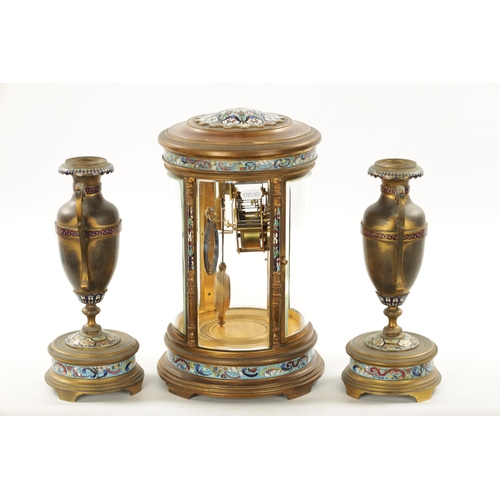 1321 - A LATE 19TH CENTURY FRENCH ORMOLU AND CHAMPLEVE ENAMEL CLOCK GARNITURE the unusual circular four-gla... 