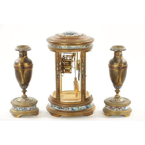 1321 - A LATE 19TH CENTURY FRENCH ORMOLU AND CHAMPLEVE ENAMEL CLOCK GARNITURE the unusual circular four-gla... 