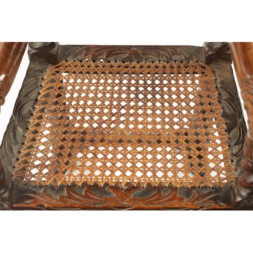 1491 - A RARE CHARLES II JOINED WALNUT CHILD’S HIGH CHAIR the elaborate leaf carved barley-twist frame with... 