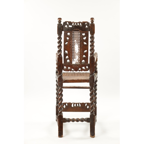 1491 - A RARE CHARLES II JOINED WALNUT CHILD’S HIGH CHAIR the elaborate leaf carved barley-twist frame with... 