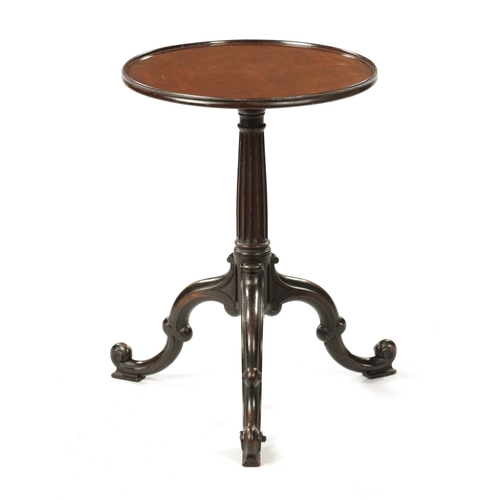 1498 - A GEORGE II CHIPPENDALE MAHOGANY KETTLE STAND with circiular moulded edge top above a tapering reede... 