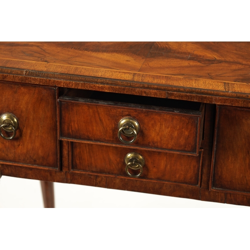 1499 - A QUEEN ANNE FIGURED WALNUT LOWBOY with quarter veneered top above four drawers with round brass han... 