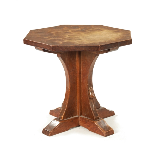 1500 - AN EARLY ROBERT 'MOUSEMAN' THOMPSON AZED OAK OCCASIONAL TABLE with an octagonal shaped top above an ... 