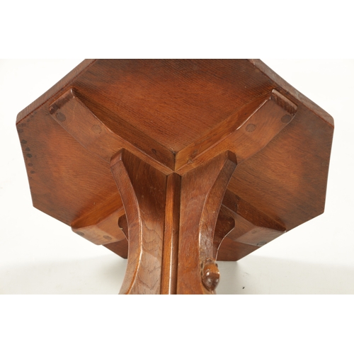 1500 - AN EARLY ROBERT 'MOUSEMAN' THOMPSON AZED OAK OCCASIONAL TABLE with an octagonal shaped top above an ... 