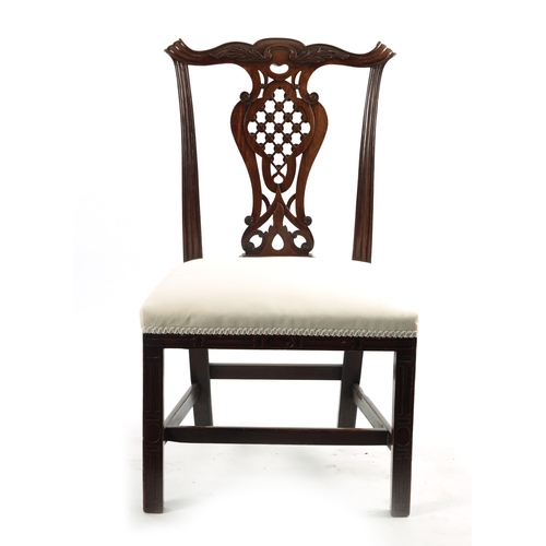 1501 - A GEORGE III MAHOGANY CHIPPENDALE STYLE SIDE CHAIR the leaf carved shaped back with pierced back spl... 