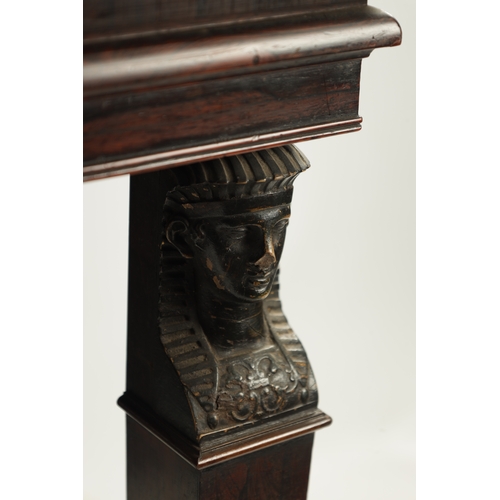 51 - A REGENCY EYPTIAN REVIVAL ROSEWOOD MIRRORED BACK CONSOLE TABLE with sphinx head tapered supports. (5... 