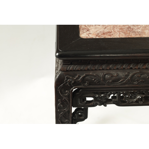 542 - A 19TH CENTURY CHINESE HARDWOOD ALTER TABLE with inset marble top above a carved base with square le... 