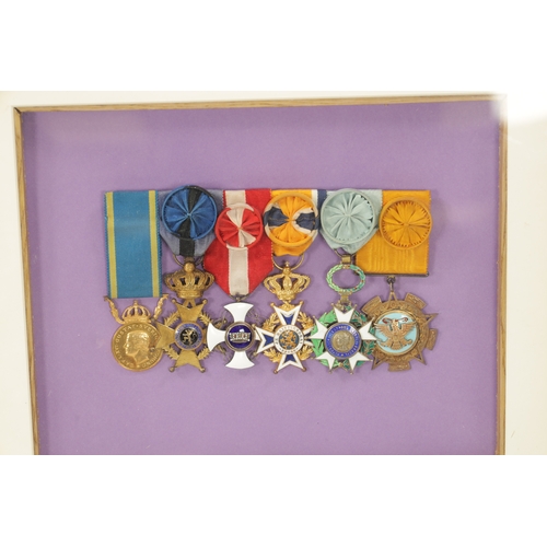 864 - A FRAMED GROUP OF SIX WW2 OFFICERS GROUP OF MEDALS comprising of A 23ct gold Medal of Merit, A Belgi... 