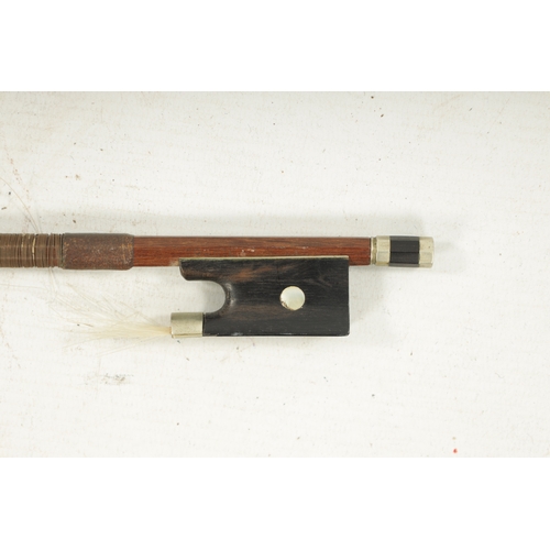 1103 - AN ANTIQUE VIOLIN BOW SIGNED TOURTE with ebony frog (69cm long)