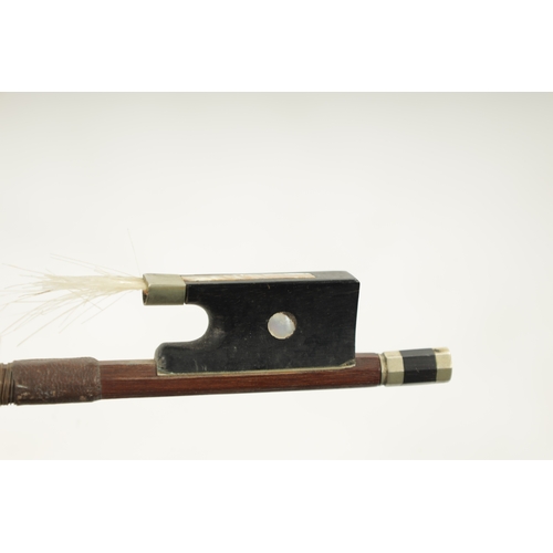 1103 - AN ANTIQUE VIOLIN BOW SIGNED TOURTE with ebony frog (69cm long)