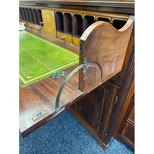 1502 - A FINE GEORGE III SHERATON DESIGN INLAID MAHOGANY BREAKFRONT BOOKCASE with shaped pediment and finia... 