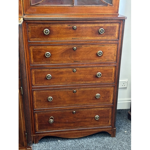 1502 - A FINE GEORGE III SHERATON DESIGN INLAID MAHOGANY BREAKFRONT BOOKCASE with shaped pediment and finia... 