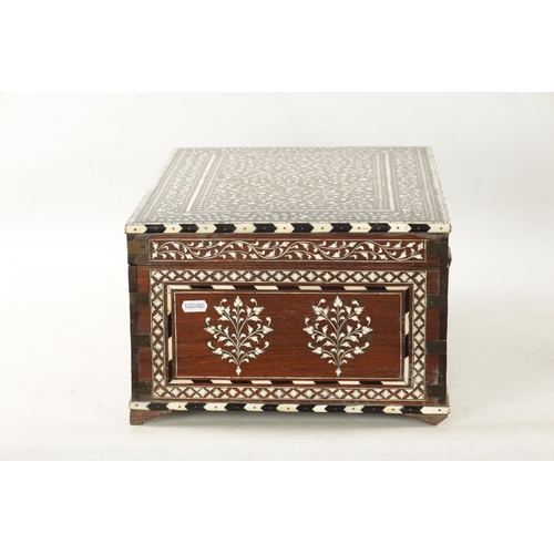 100 - A LARGE LATE 19TH CENTURY ANGLO-INDIAN IVORY AND EBONY INLAID WORKBOX with fine scrolling branch wor... 