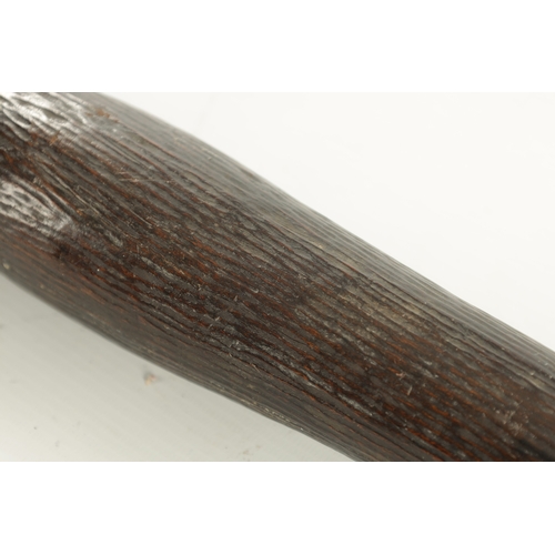 101 - A 19TH CENTURY AUSTRALIAN ABORIGINE NULLA WADDY CLUB of typical form with carved grip. (76.5cm overa... 