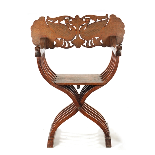 108 - A 19TH CENTURY INDIAN HARDWOOD AND BRASS INLAID FOLDING SAVONAROLA ARMCHAIR with peacock-shaped back... 