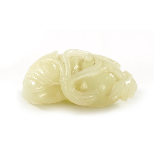 113 - A 19TH CENTURY CHINESE CARVED WHITE JADE SCULPTURE OF A POMEGRANATE with vine work and perched bird ... 