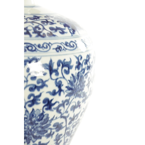 115 - A 19TH CENTURY CHINESE BLUE AND WHITE CHINESE VASE with floral allround decoration; raised on a hard... 