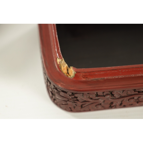 119 - A 19TH CENTURY CHINESE CINNABAR LACQUERWORK BOX with finely carved domestic and pine tree lined land... 