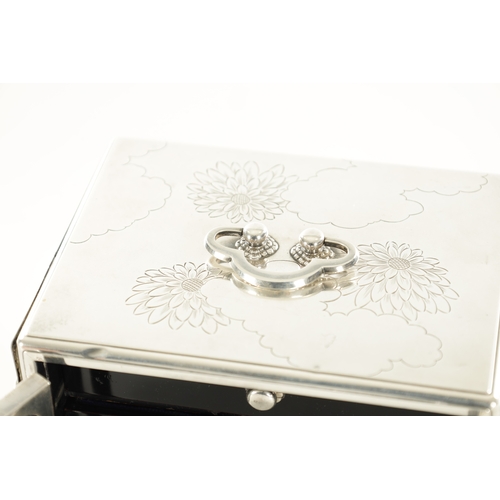 121 - A JAPANESE MEIJI PERIOD SILVER AND LACQUER JEWELLERY BOX the sides and top engraved with chrysanthem... 