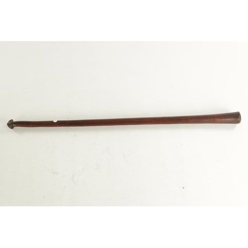 130 - A 19TH CENTURY VANUATU “WIFE BEATER” HAND CLUB MELANESIA WOOD of turned tapering form with a domed t... 