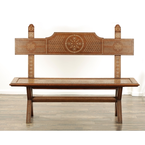 143 - A LATE 19TH CENTURY ANGLO INDIAN SANDEL WOOD AND BONE MARQUETRY HALL BENCH with profusely inlaid geo... 