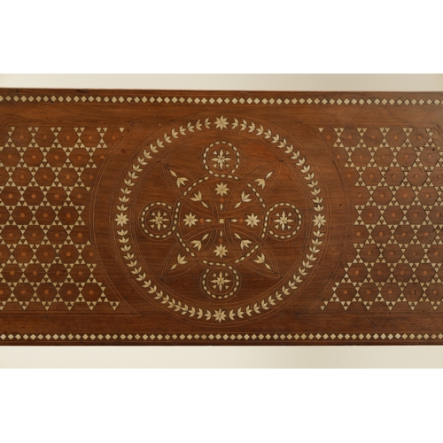 143 - A LATE 19TH CENTURY ANGLO INDIAN SANDEL WOOD AND BONE MARQUETRY HALL BENCH with profusely inlaid geo... 