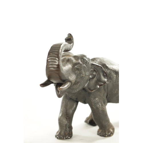 146 - A JAPANESE MEIJI PERIOD PATINATED BRONZE SCULPTURE modelled as an elephant, inscribed two character ... 