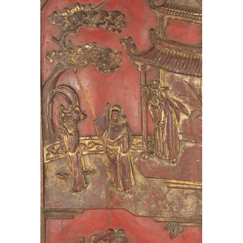 149 - AN EARLY 20TH CENTURY CHINESE CARVED LACQUERWORK PANEL depicting figures under pagodas and trees. (3... 