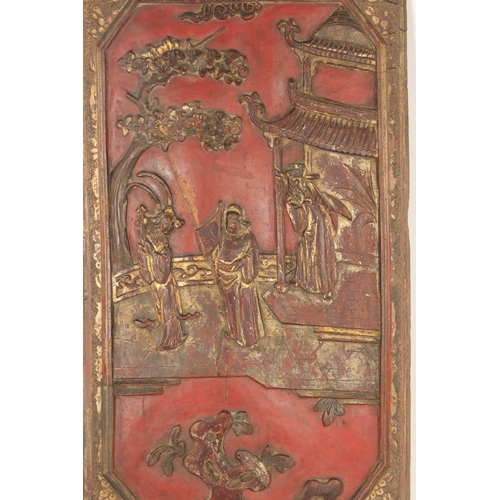 149 - AN EARLY 20TH CENTURY CHINESE CARVED LACQUERWORK PANEL depicting figures under pagodas and trees. (3... 