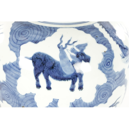 150 - A 19TH CENTURY CHINESE BLUE AND WHITE PORCELAIN GINGER JAR decorated with dragons and mythical creat... 
