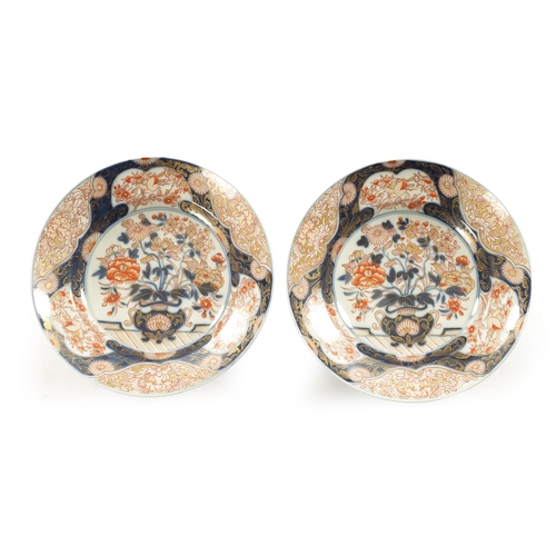 153 - A FINE PAIR OF 18TH CENTURY JAPANESE IMARI DISHES decorated with floral designs decorated in gilt-hi... 