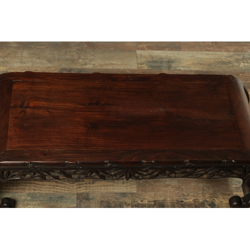 154 - A 19TH CENTURY CHINESE CARVED HARDWOOD ALTAR TABLE with faux bamboo carved front and scrolled sides.... 