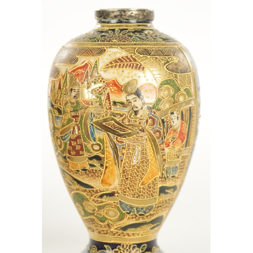 156 - A LARGE PAIR OF JAPANESE SATSUMA VASES decorated with figures, having gilt highlights on a blue grou... 