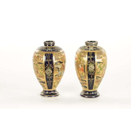 156 - A LARGE PAIR OF JAPANESE SATSUMA VASES decorated with figures, having gilt highlights on a blue grou... 