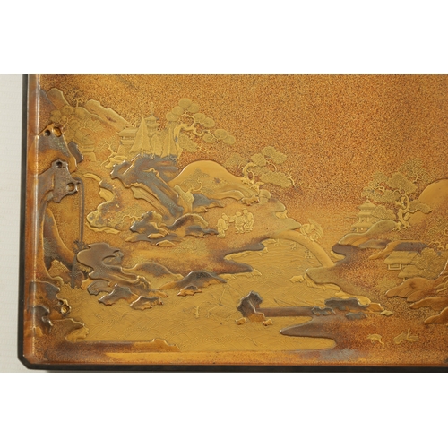 157 - A FINE EDO-PERIOD JAPANESE LACQUER SUZURIBAKO (WRITING BOX). The cover decorated in gold and silver ... 