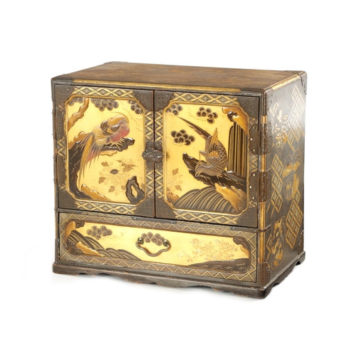 159 - A JAPANESE MEIJI-PERIOD GILT LACQUERED TABLE CABINET having engraved bronze mounts and panelled door... 