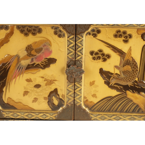 159 - A JAPANESE MEIJI-PERIOD GILT LACQUERED TABLE CABINET having engraved bronze mounts and panelled door... 