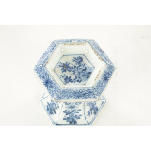 162 - AN 18TH CENTURY CHINESE KANGXI BLUE AND WHITE HEXAGONAL PORCELAIN TABLE SALT decorated with flowers ... 