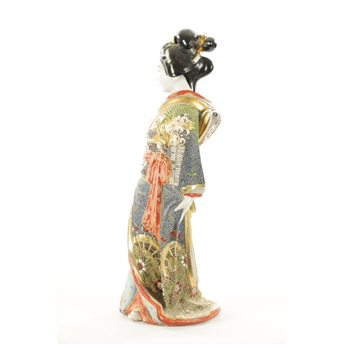 163 - A LATE 19TH CENTURY CHINESE HARDSTONE FIGURE OF A GEISHA the standing young lady begowned in gilt an... 