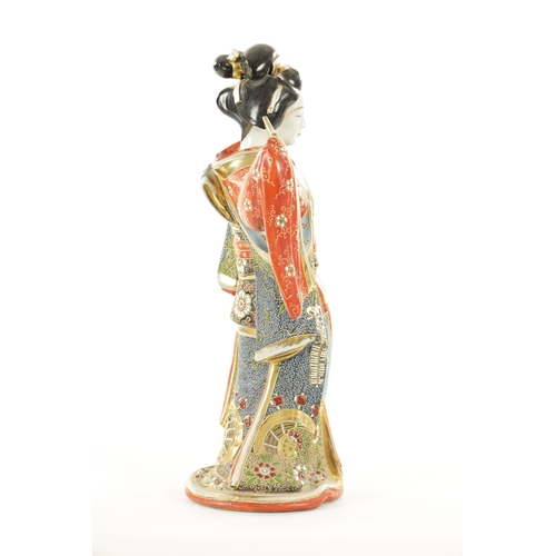 163 - A LATE 19TH CENTURY CHINESE HARDSTONE FIGURE OF A GEISHA the standing young lady begowned in gilt an... 