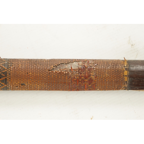 164 - A 19TH CENTURY SOLOMON ISLAND MELANESIAN PADDLE CLUB with carved central rib, the shaft finely bound... 