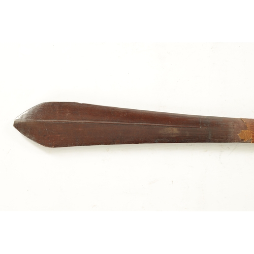 164 - A 19TH CENTURY SOLOMON ISLAND MELANESIAN PADDLE CLUB with carved central rib, the shaft finely bound... 