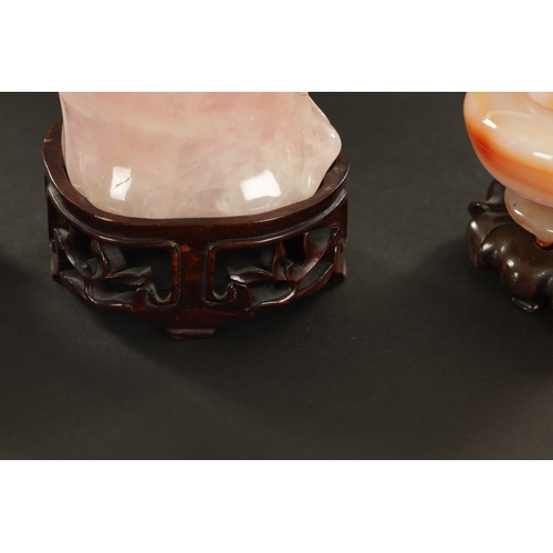 168 - A COLLECTION OF THREE CHINESE HARDSTONE SCULPTURES modelled as an agate Koro and cover on hardwood b... 