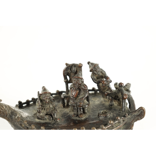 183 - A 19TH CENTURY JAPANESE BRONZE SCULPTURE depicting fishermen in a boat with a cockerel's figurehead ... 