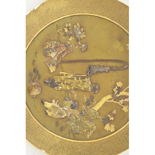 197 - A JAPANESE MEIJI PERIOD CIRCULAR BRONZE AND MIXED METAL INLAID PLATE decorated with figures and a lo... 