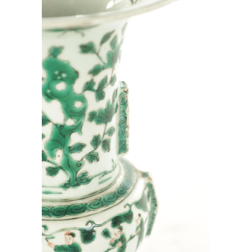 199 - A 19TH CENTURY CHINESE FAMILLE VERTE SHAPED PORCELAIN VASE with leafwork and figural decoration. (24... 